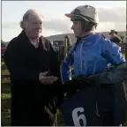  ??  ?? Paddy Quinlan, trainer of Handy Headon, with jockey Barry O’Neill at Tinahely.