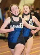  ?? ?? Saratoga’s Emily Bush wins the girls’ 1,500-meter race followed by her teammate Ella Kurto, who won the 3,000 for the Streaks.