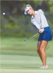  ?? AP-Yonhap ?? Nelly Korda hits to the 18th green during the third round of the LPGA Tour’s Marathon Classic golf tournament at Highland Meadows Golf Club in Sylvania, Ohio, Saturday.