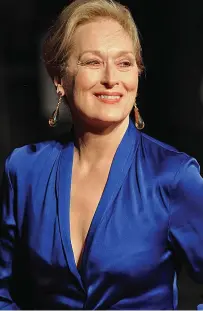  ??  ?? The plunging neckline of this flattering blue Lanvin gown shows off the fullest part of 66-year-old Meryl Streep’s bosom, while ruching at the waist draws the eye to the thinnest point of her figure