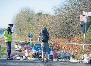  ?? ?? IRELAND IN MOURNING: Floral tributes laid at the Grand Canal in Tullamore, Co Offaly, following the murder of 23-year-old teacher Ashling Murphy.