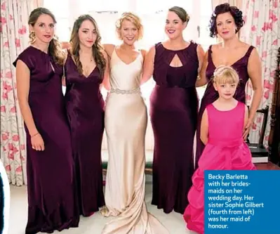  ??  ?? Becky Barletta with her bridesmaid­s on her wedding day. Her sister Sophie Gilbert (fourth from left) was her maid of honour.