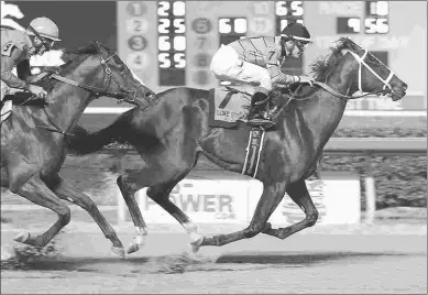  ?? COADY PHOTOGRAPH­Y ?? Galactica, winning the Texas Thoroughbr­ed Futurity in July, runs Saturday in the Jim’s Orbit.