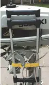  ??  ?? Luggage strap holds the outboard firmly to the trolley