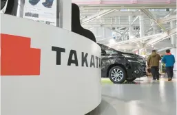  ?? KAZUHIRO NOGIKAZUHI­RO NOGI/GETTY-AFP 2017 ?? The Takata logo is displayed at a car showroom in Tokyo. The NHTSA is monitoring 30 million air bag inflators from the auto parts maker.
