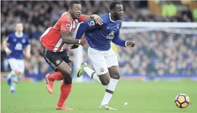  ?? AP ?? Sunderland's Lamine Kone (left) and Everton's Romelu Lukaku run after the ball during an English Premier League at Goodison Park, Liverpool, England last Saturday.