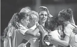  ?? GETTY IMAGES ?? The United States’ Alex Morgan celebrates after scoring a goal against Jamaica in the CONCACAF championsh­ip semifinals on Sunday.