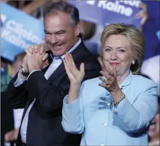  ?? AL DIAZ, TNS ?? Democratic presidenti­al candidate Hillary Clinton introduces running mate Tim Kaine in Miami on Saturday. The Democratic National Convention starts Monday in Philadelph­ia. Watch for a weeklong selling job.
