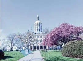  ?? Lau Guzmán/Hearst Connecticu­t Media ?? The state Capitol in Hartford. The Office of Health Strategy says it has hired additional staff and is seeking to correct deficienci­es cited in a state audit.