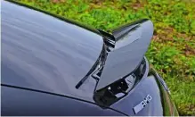  ??  ?? Pop-up rear spoiler adds downforce, while the twin-turbo V8 engine sounds great through the AMG’s quad exhaust pipes