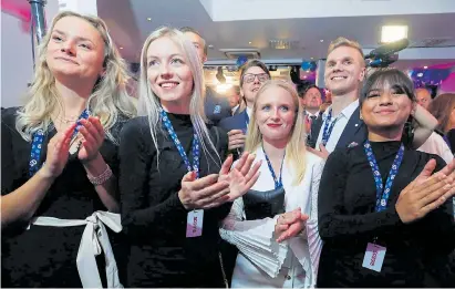  ??  ?? Far-Right Democrats show their delight in Stockholm last night with gains predicted in the exit polls