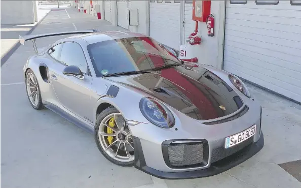  ?? PHOTOS: NEIL VORANO/DRIVING ?? Porsche has increased the horsepower of the 911 GT2 RS from 500 hp to a mind-boggling 700 hp in the 2018 model.