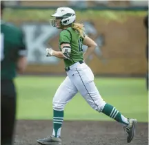  ?? ?? Gianna Russo rounds the bases after hitting a homer against Evergreen Park.