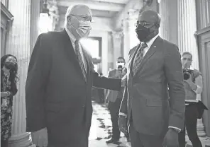  ?? CHIP SOMODEVILL­A/ GETTY IMAGES ?? Senate President Pro Tempore Patrick Leahy, D- Vt., with Sen. Raphael Warnock, D- Ga., outside the Senate chamber on Jan. 28. Leahy will preside over the second impeachmen­t trial of Donald Trump.