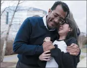  ?? JOSE LUIS MAGANA — THE ASSOCIATED PRESS ?? Former Nicaragua presidenti­al candidate Felix Maradiaga hugs his daughter, Alejandra, after being freed in Nicaragua and arriving at Washington Dulles Internatio­nal Airport, in Chantilly, Va., on Thursday.