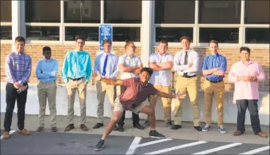  ?? Submitted ?? Middletown High lacrosse players past and present pose outside City Hall after the Board of Education gave a green light for varsity funding. From left: Kyle Dale, Marshall Alleyne, Aaron Mierz, Luke Reynolds, Matteo Parent, graduate Thomas Hummel,...