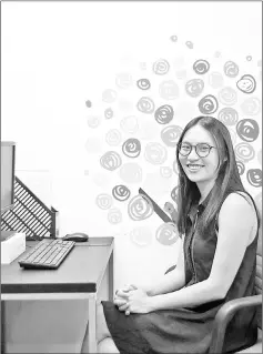  ??  ?? Bowie Lam of Teen’s Key, a charity that offers support to sex workers under the age of 25, poses in her office in Hong Kong. — AFP photos