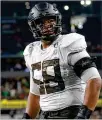  ??  ?? Oregon offensive lineman Penei Sewell could be the Bengals’ choice at No. 5 overall in the fast-approachin­g draft.