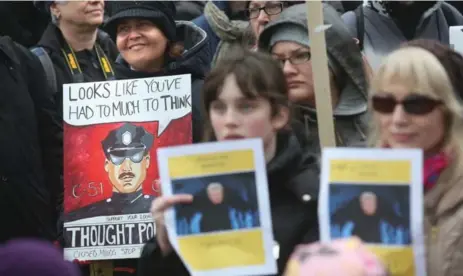  ?? VINCE TALOTTA/TORONTO STAR ?? A crowd, above and bottom left, in Nathan Phillips Square in Toronto Saturday protested against Bill C-51, the federal government’s proposed anti-terrorism legislatio­n. In Montreal, bottom right, some demonstrat­ors taped their mouths to protest the...