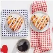  ?? CONTRIBUTE­D PHOTO FROM BOJANGLES’ ?? Bojangles’ Bo-Berry Biscuits come in heart shapes for Valentine’s Day.