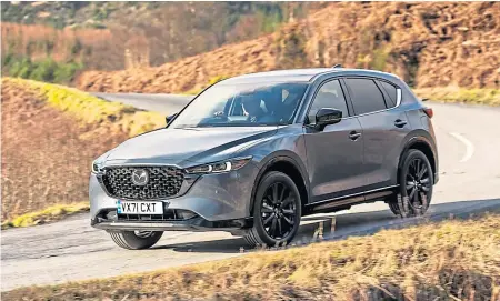 ?? ?? The Mazda CX-5 has overtaken mid-size SUV competitio­n with a combinatio­n of refinement, comfort and practicali­ty. The new version subtly improves on its winning formula.