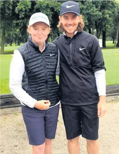  ??  ?? ●● Lauren Jones getting advice from Tommy Fleetwood