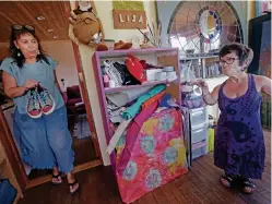  ?? PHOTOS BY LUIS SÁNCHEZ SATURNO/THE NEW MEXICAN ?? LEFT: Lisa G. McDonough, left, and Lesley Sneider, of Purple Turtle Studios, make shoes for little people at McDonough’s home in Santa Fe.