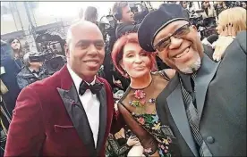  ??  ?? Robert “Bobby” Allen of Washington Twp. is pictured with Kevin Frazier and Sharon Osbourne from “Entertainm­ent Tonight” at the 92nd annual Academy Awards ceremony Feb. 9.