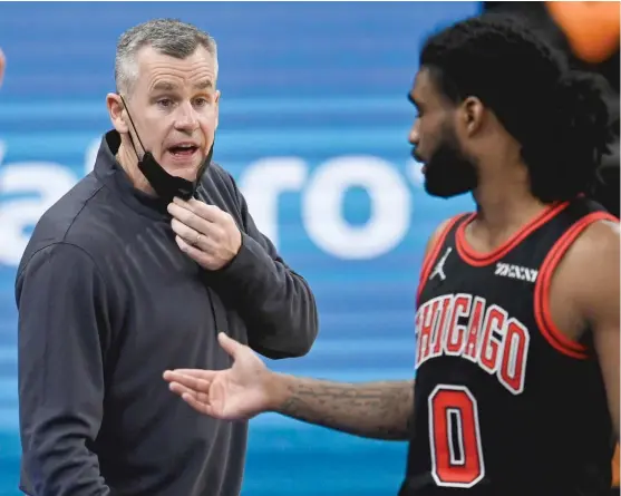  ?? DARREN ABATE/AP ?? Bulls coach Billy Donovan talks to guard Coby White during the second half of the game against the San Antonio Spurs on Saturday night.