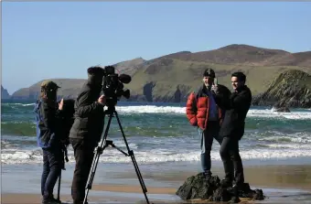  ?? Photos by Don MacMonagle. ?? Local mountainee­r and adventurer Mike O’Shea, who worked on both The Force Awakens and The Last Jedi, is interviewe­d about his experience­s working on the Star Wars films on Cam Dhíneol Beach in west Kerry.