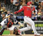  ?? BOB LEVEY/GETTY IMAGES ?? Angels outfielder Kole Calhoun had been hitless in 20 atbats before singling in a run in the fifth inning against the Astros on Monday. The Angels, 2-0 winners, handed Gerrit Cole his first loss.