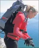  ??  ?? Actress Kate Winslet is filmed contemplat­ing the long drop down before taking the plunge from a Welsh mountain