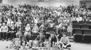  ??  ?? St Joseph debaters (front) with other participan­ts and guests-of-honour after the prize presentati­on.