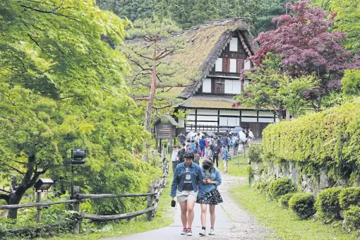  ??  ?? In Takayama, Gifu Prefecture, take a bus or walk the 2.5km from JR Takayama Station to Hida no Sato (Hida Folk Village), an open-air museum which opened in 1971. The village is home to about 30 houses which have been moved from their original locations...