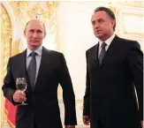  ?? (Reuters) ?? VITALY MUTKO (left) remains the Russian sports minister after receiving a vote of confidence from president Vladimir Putin (right), despite the widespread evidence of a state-sponsored doping program that has jeopardize­d the country’s Olympic...