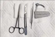 ?? Angel Chevrett ?? A mohel’s traditiona­l circumcisi­on tools.