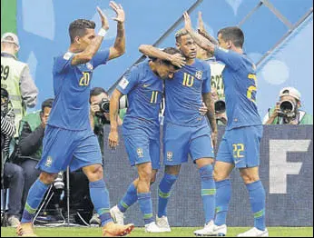  ?? AP ?? Philippe Coutinho (No 11) celebrates Brazil’s opening goal. Costa Rica were eliminated.
