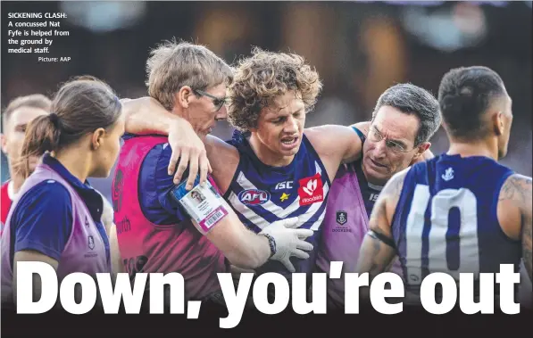  ?? Picture: AAP ?? SICKENING CLASH: A concussed Nat Fyfe is helped from the ground by medical staff.