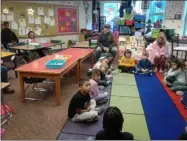  ?? MELISSA SCHUMAN — MEDIANEWS GROUP ?? Dads watch as students participat­e in Morning Meeting in Bonnie O’Connor’s first grade class.