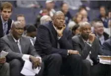  ?? NICK WASS — THE ASSOCIATED PRESS ?? Georgetown head coach Patrick Ewing, center, looks on during the second half of Sunday’s win over Jacksonvil­le.