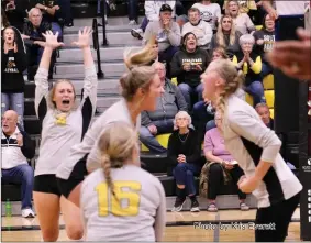  ?? Photo by Kris Everett ?? The South Adams Starfires celebrate a point during the fifth set in their wild sectional victory over rival Adams Central. The defending sectional champions advanced to Saturday’s semifinal with the victory.