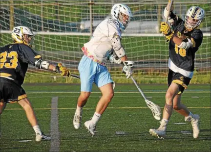  ?? GENE WALSH — DIGITAL FIRST MEDIA ?? North Penn’s Eric Diamond takes a shot on goal Friday night.