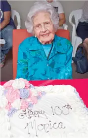  ??  ?? Monica Carse is overwhelme­d yet excited to celebrate turning 100 with a special afternoon tea at Abbeys Garden in Warragul alongside her six children, family and friends, some of whom had travelled from overseas.