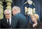  ?? BEBETO MATTHEWS/AP ?? John Miller, left, NYPD deputy commission­er, Malcolm Hoenlein of the Conference of Presidents of Major Jewish Organizati­ons and Rep. Carolyn Maloney, D-N.Y., confer after a Friday news conference about bomb threats.