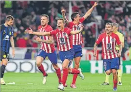  ?? AFP ?? Atletico Madrid players celebrate victory against Inter Milan on Wednesday.