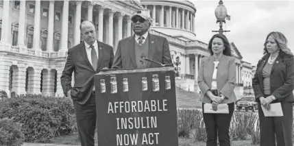  ?? J. SCOTT APPLEWHITE/AP ?? From left, Rep. Dan Kildee, D-Mich., House Majority Whip James Clyburn, D-S.C., Rep. Angie Craig, D-Minn., and Rep. Lucy McBath, D-Ga., talk about their support for legislatio­n aimed at capping the price of insulin Thursday in Washington.