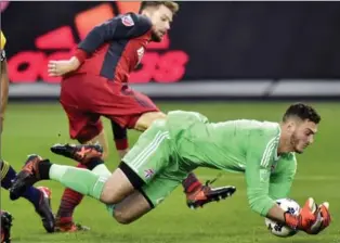  ?? CANADIAN PRESS FILE PHOTO ?? Toronto FC goalkeeper Alex Bono makes a save against the New York Red Bulls on Nov. 5. Bono took over for an injured Clint Irwin in TFC’s home opener March 31, and has played 29 of 32 games since.