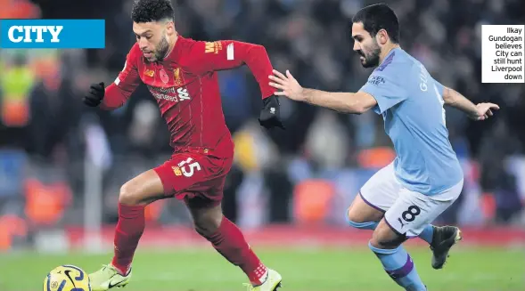  ??  ?? Ilkay Gundogan believes City can still hunt Liverpool down