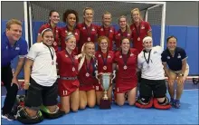  ?? COURTESY MARK PALCZEWSKI — USA FIELD HOCKEY ?? The U.S. Women’s National Indoor Team poses with the championsh­ip trophy after winning the Indoor Pan American Cup on Sunday, June 28 at The Training Center in Spring City.