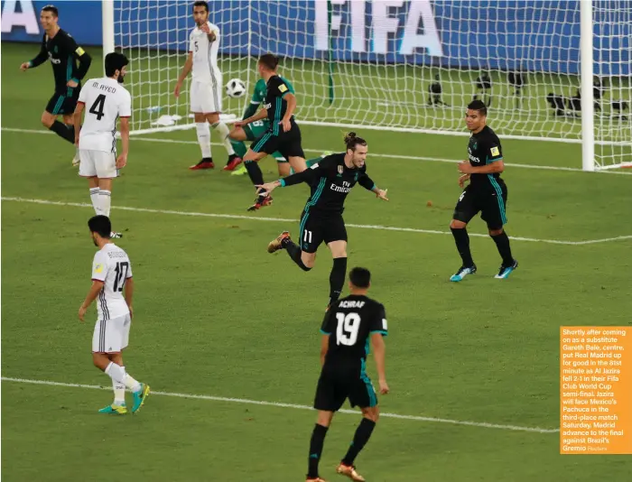  ?? Reuters ?? Shortly after coming on as a substitute Gareth Bale, centre, put Real Madrid up for good in the 81st minute as Al Jazira fell 2-1 in their Fifa Club World Cup semi-final. Jazira will face Mexico’s Pachuca in the third-place match Saturday. Madrid...